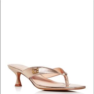 Coach sandals new never used, gold.
